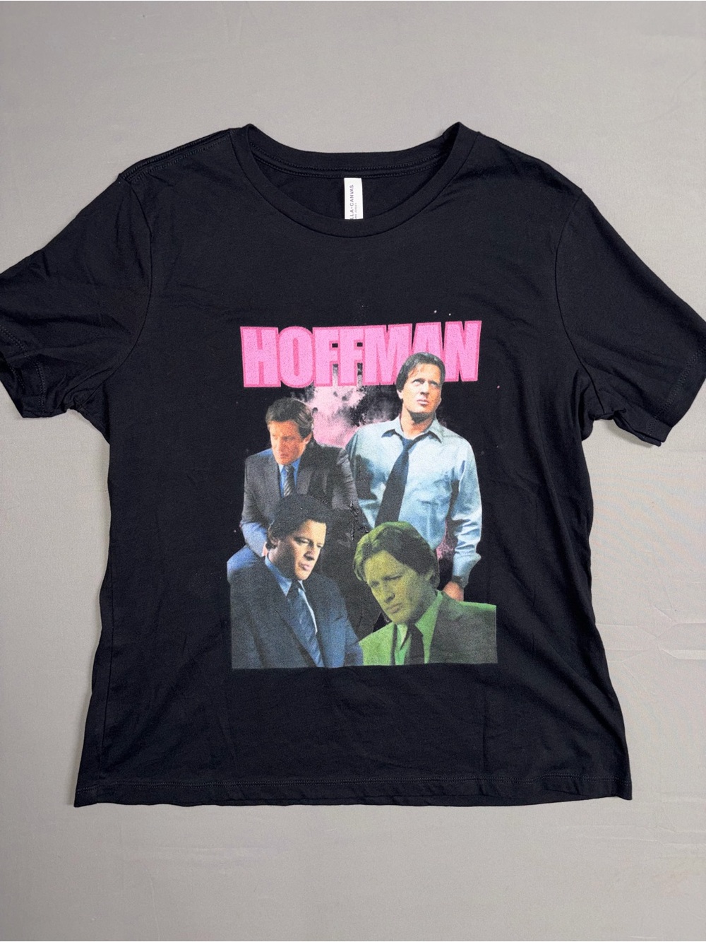 Black Graphic Tee with Pink "HOFFMAN" from saw horror movie